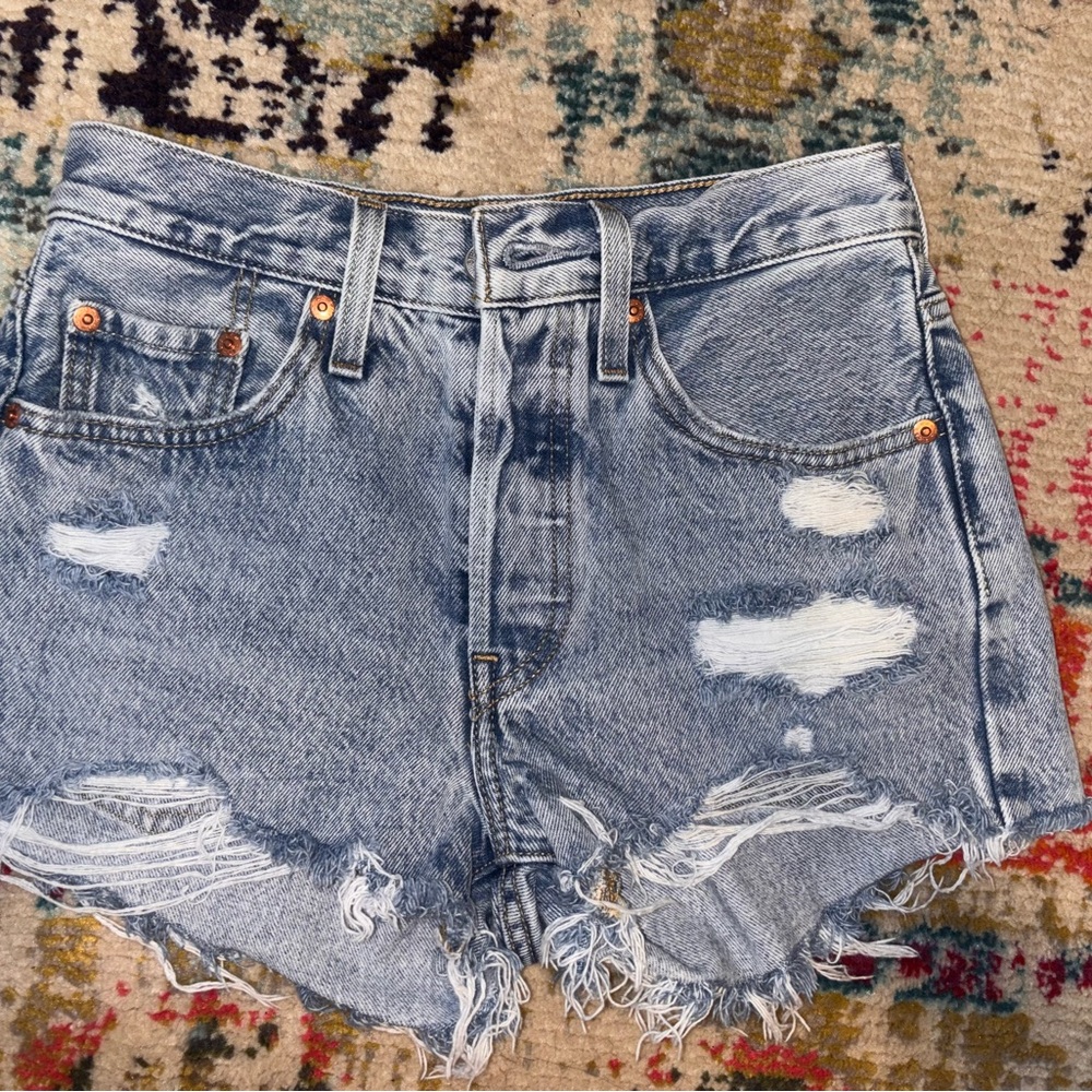 501 Levi’s distressed denim shorts size 24